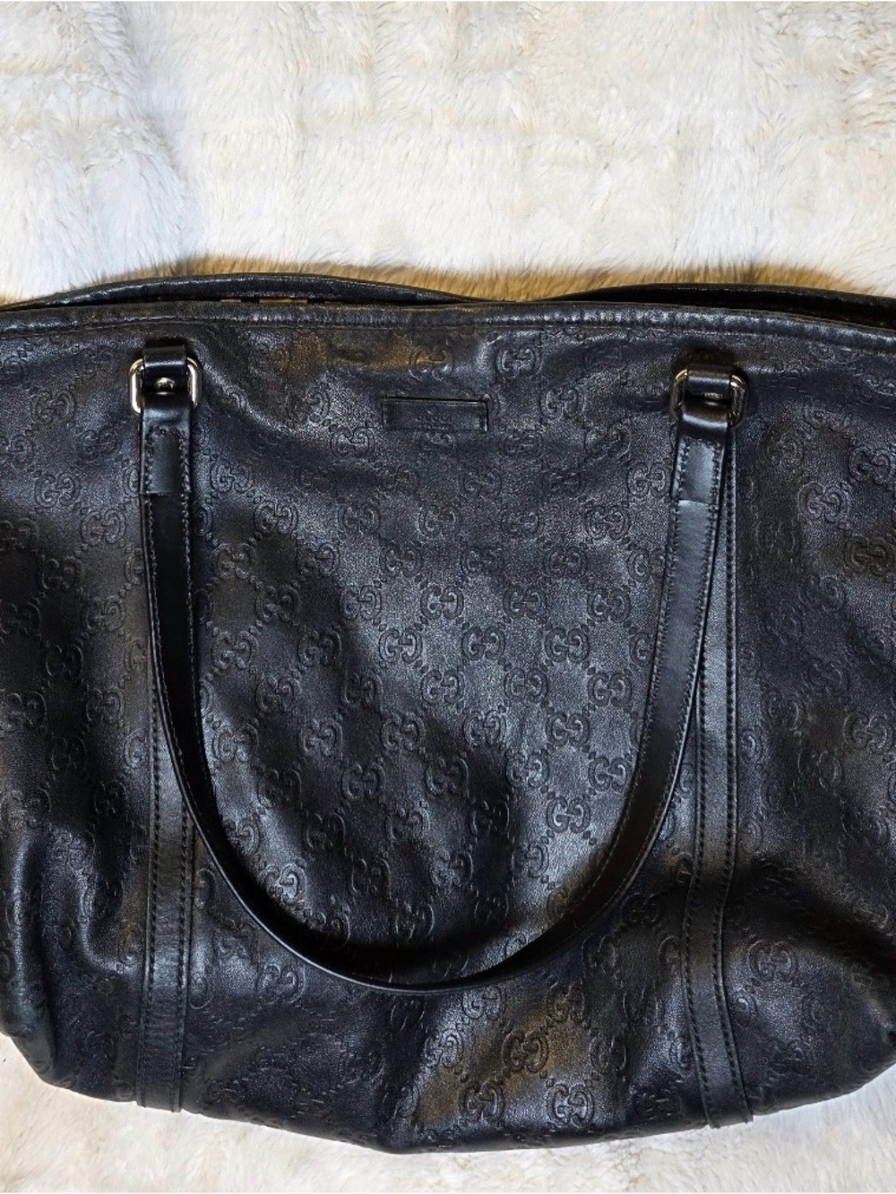 Authentic Gucci GG Guccissima black leather tote bag.